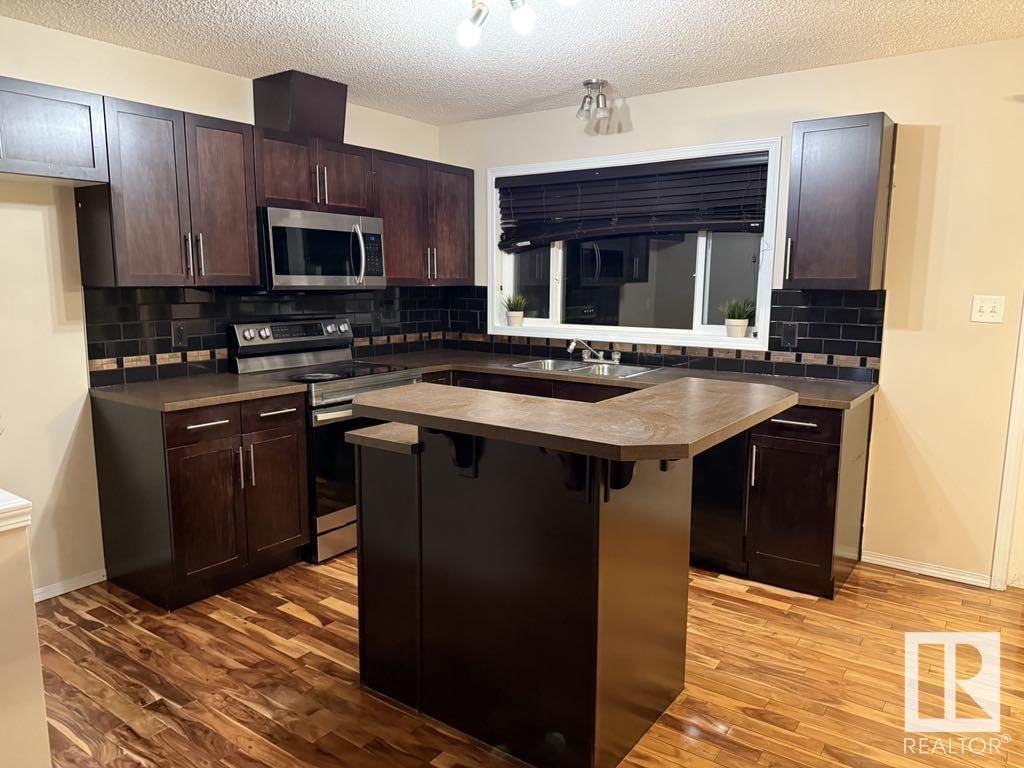 SW - 7113 21 AV Image 19