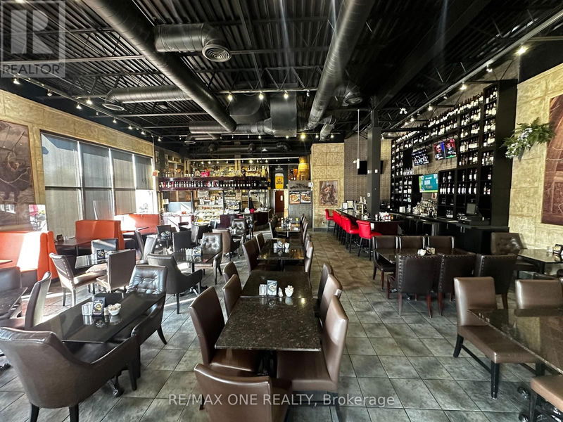 Image #1 of Restaurant for Sale at 338 Rossland Road E, Ajax , Ontario