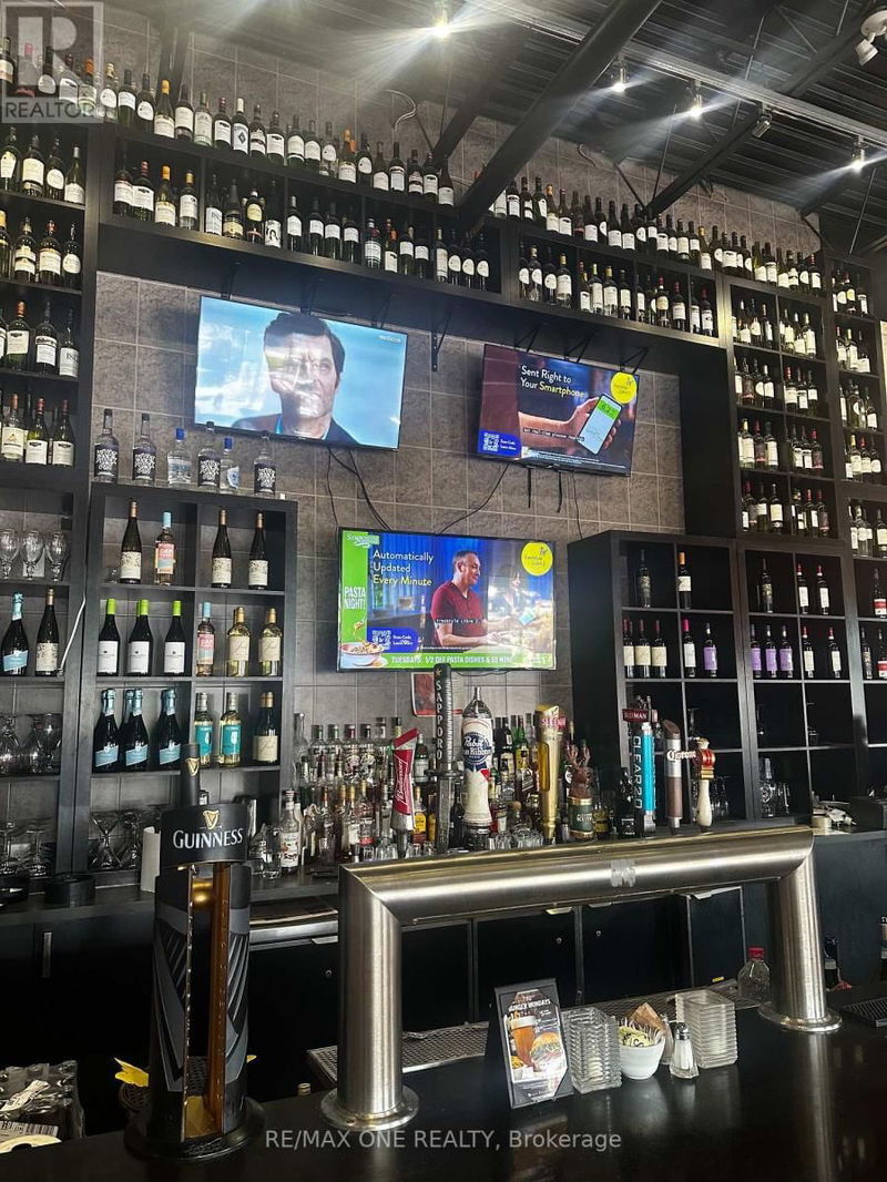 Image #1 of Restaurant for Sale at 338 Rossland Road E, Ajax , Ontario