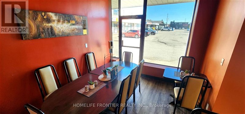 Image #1 of Restaurant for Sale at #1 & 2 -213 The Queens Way S, Georgina, Ontario