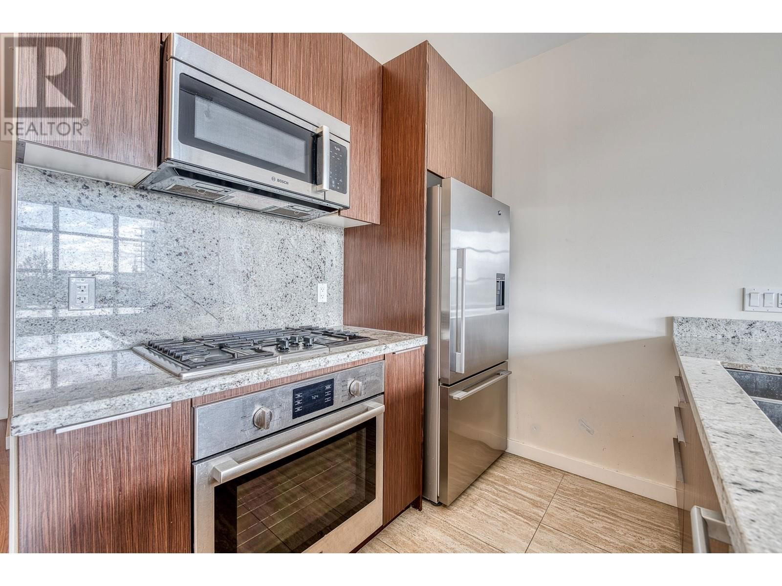 305 - 8633 CAPSTAN WAY Image 6