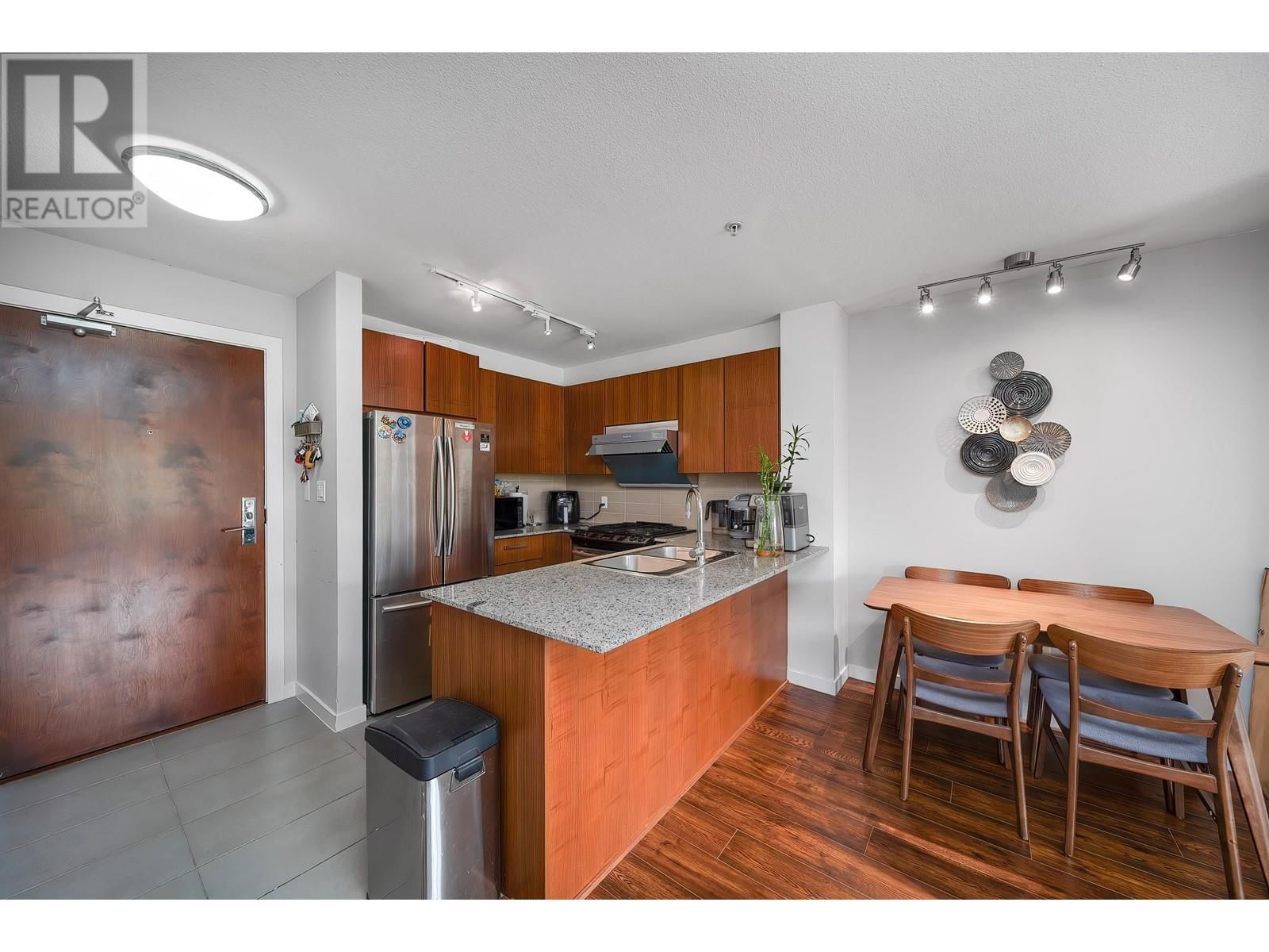 214 - 5885 IRMIN STREET Image 2