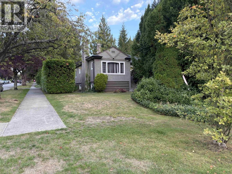 7606 ANGUS Drive Vancouver British Columbia, V6P 5K4 - 4 Bedrooms Home For Sale