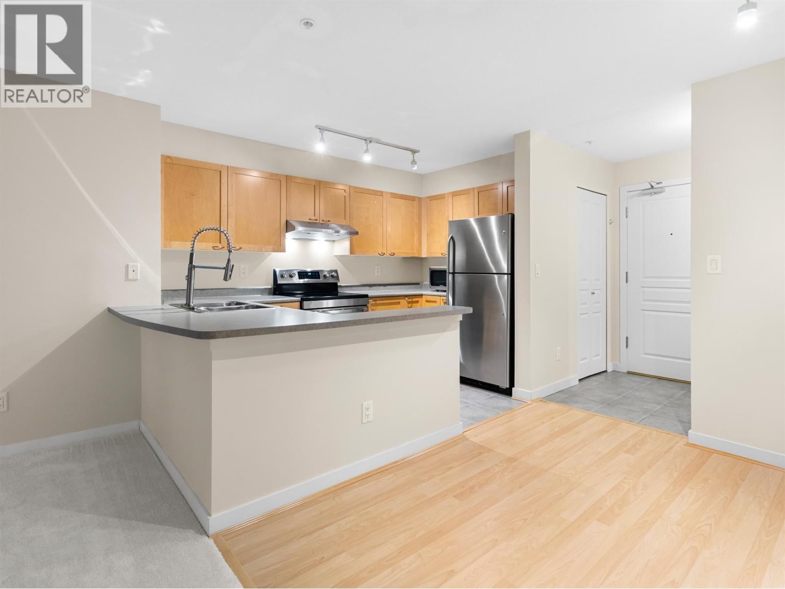 207 - 7383 GRIFFITHS DRIVE Image 7