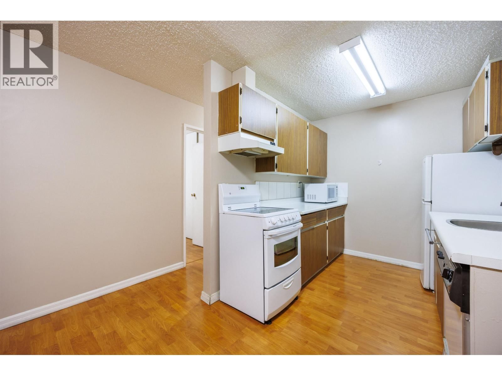 201 - 7200 LINDSAY ROAD Image 13