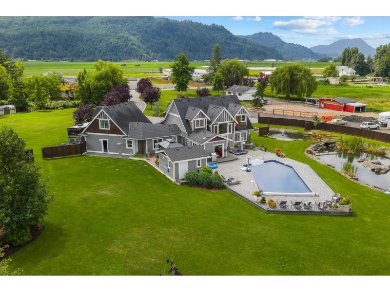 49517 PRAIRIE CENTRAL Road Chilliwack British Columbia, V2P 6H3 - 6 Bedrooms Waterfront Home For sale