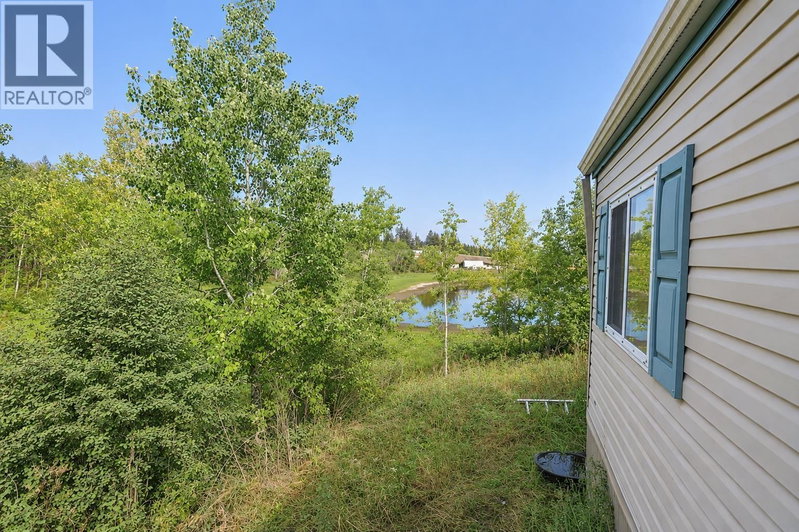 5465 ELLIOT LAKE Road 108 Mile Ranch British Columbia, V0K 2E1 - 2 Bedrooms Waterfront Home For sale