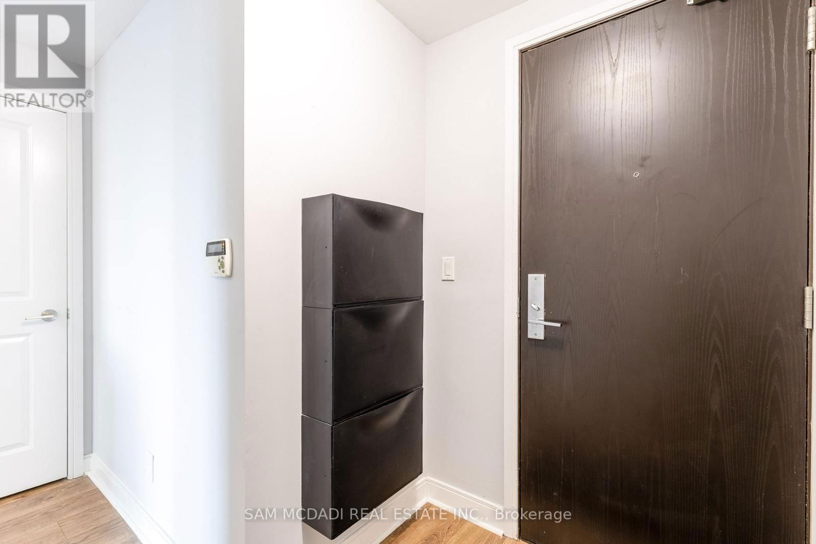 310 - 70 ABSOLUTE AVENUE Image 2