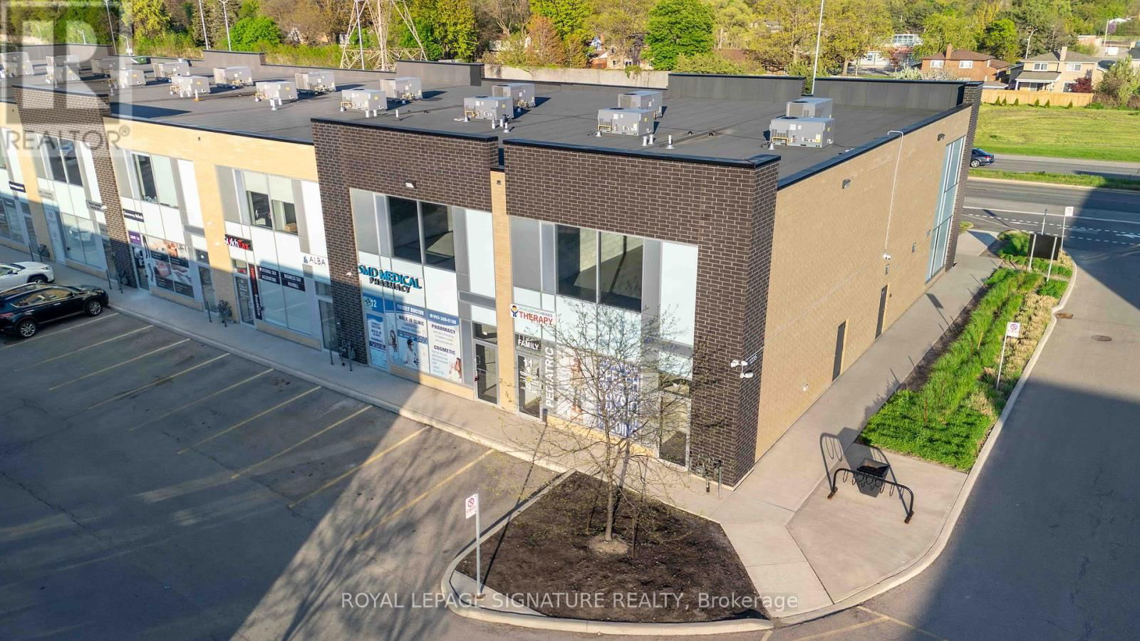 12A - 1235 QUEENSWAY EAST Image 1