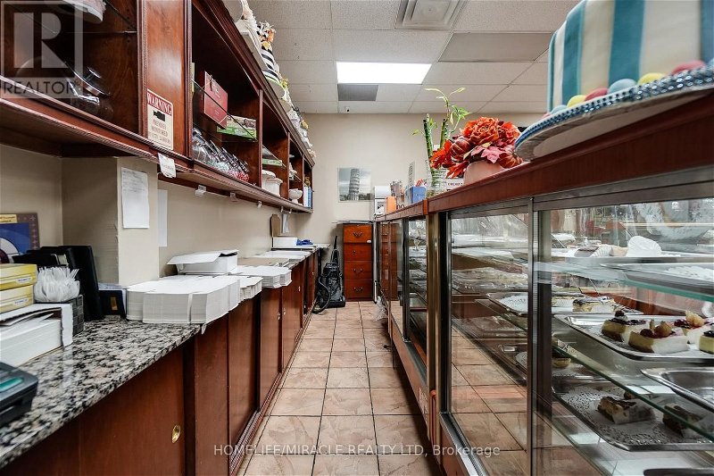 Image #1 of Restaurant for Sale at #1 -4910 Tomken Rd, Mississauga, Ontario