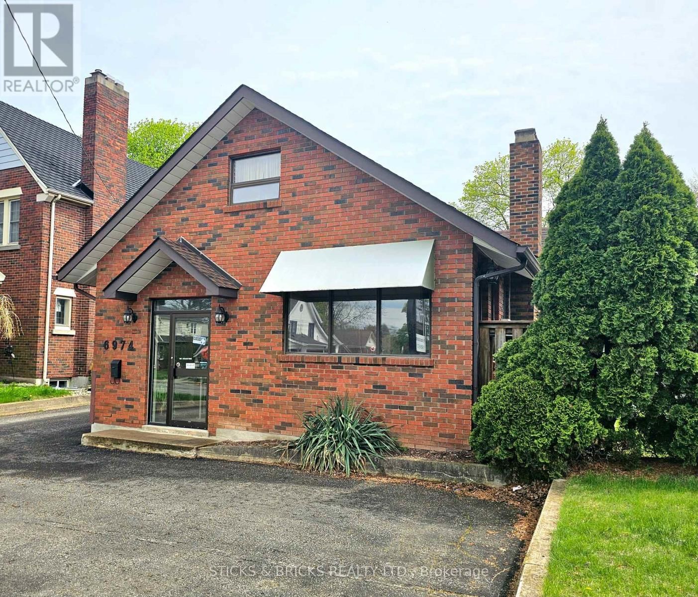 6974 LUNDYS LANE Image 1