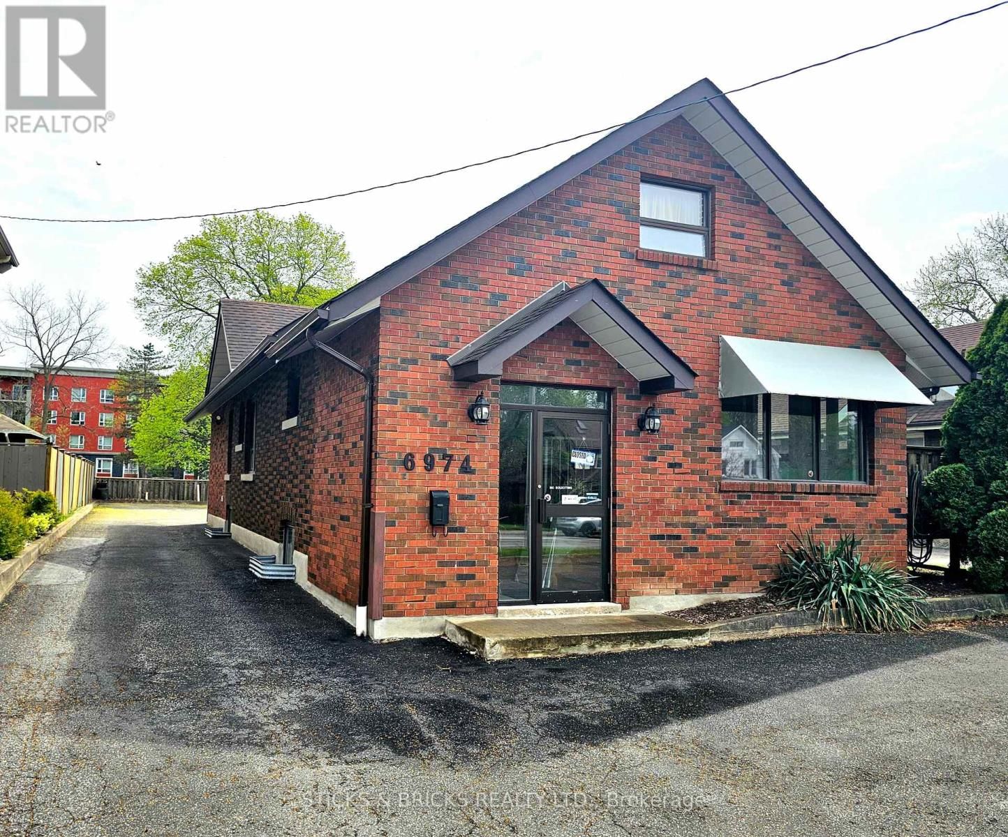 6974 LUNDYS LANE Image 2