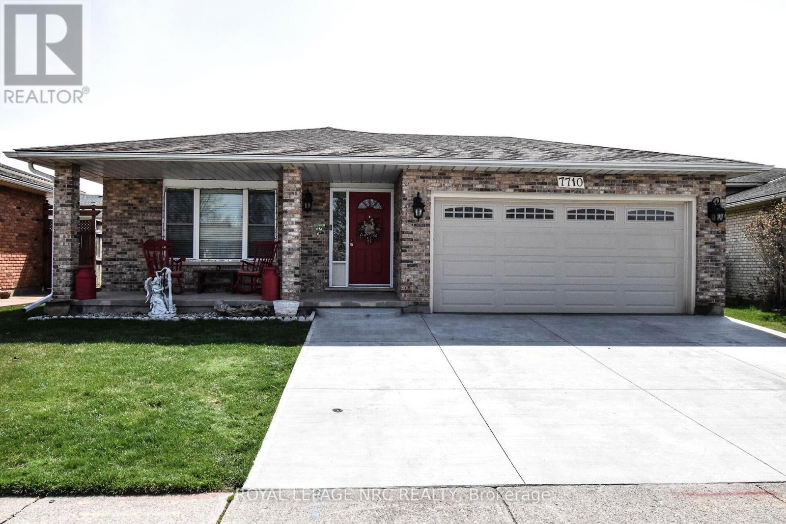 7710 PREAKNESS STREET Image 1