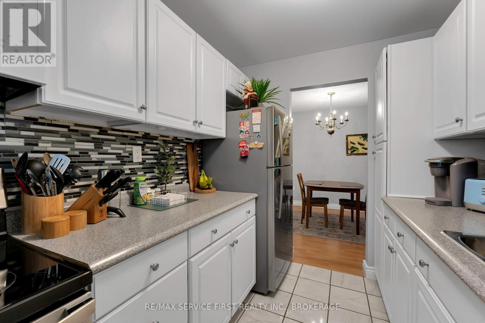 103 - 1010 PEMBRIDGE CRESCENT Image 14