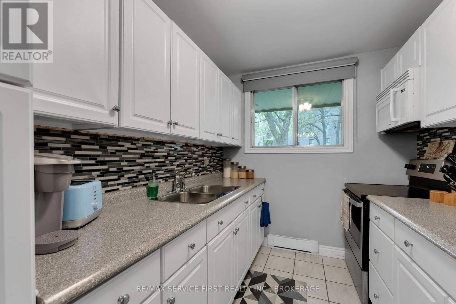 103 - 1010 PEMBRIDGE CRESCENT Image 16