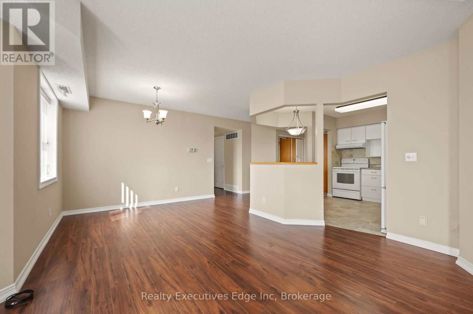312 - 208 SILVERCREEK PARKWAY NORTH Image 16