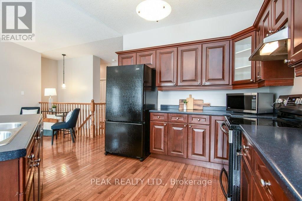 3 - 900 DOON VILLAGE ROAD Image 21