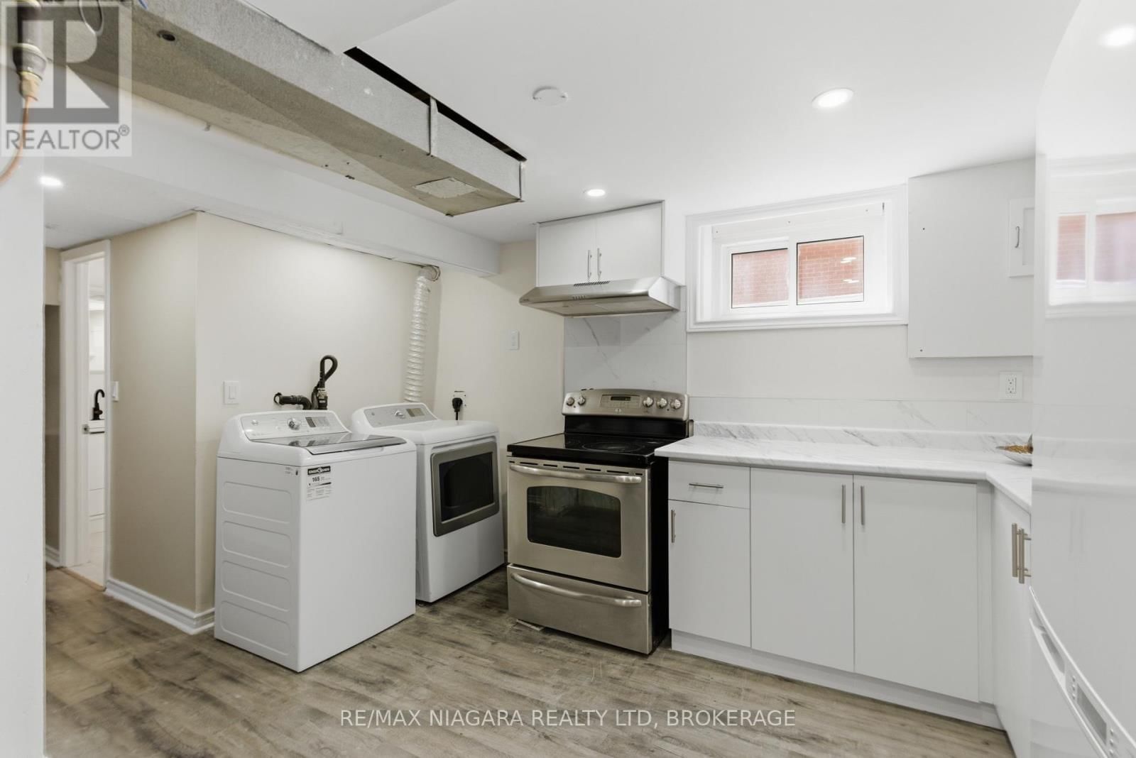 5654 DRUMMOND ROAD Image 27