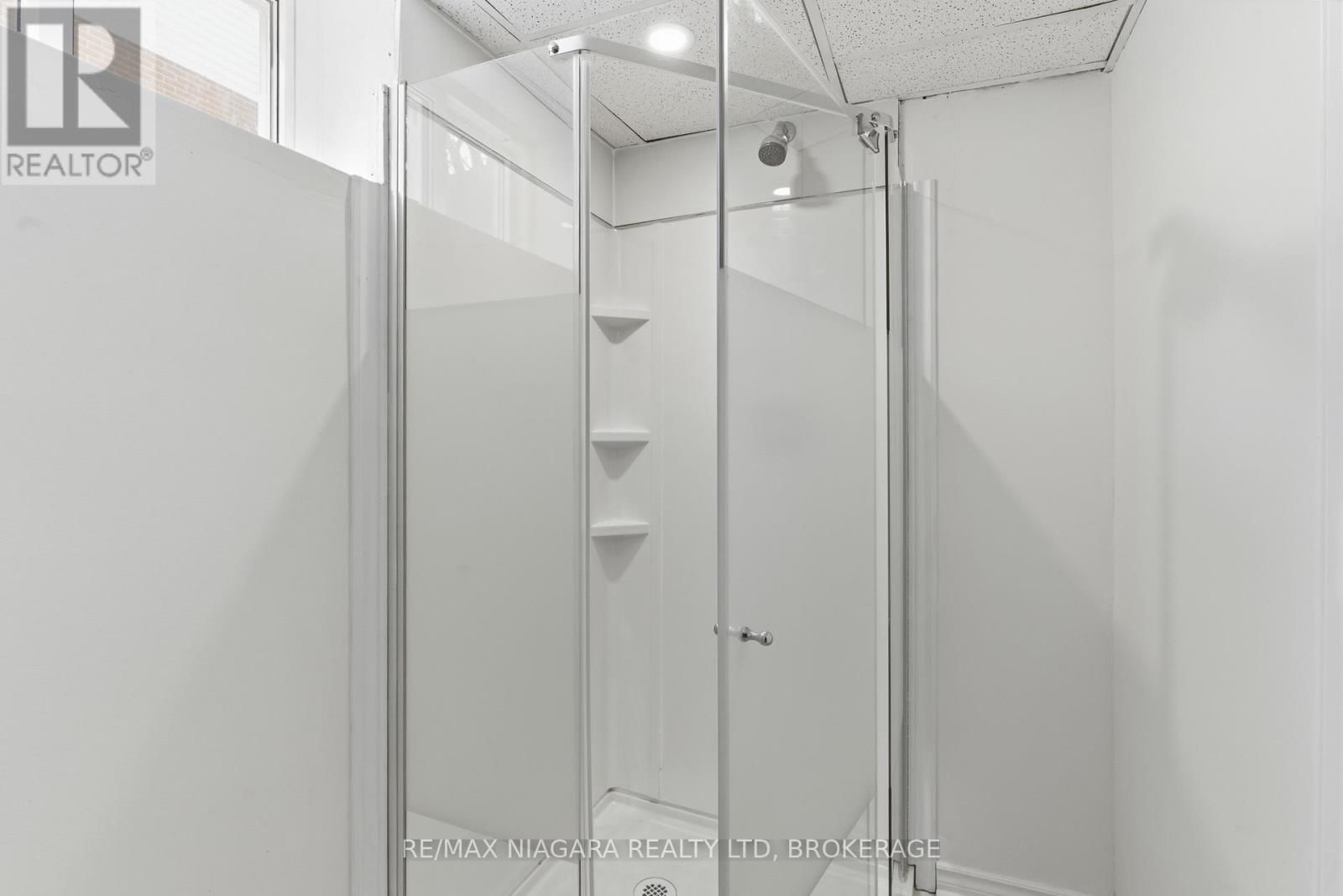 5654 DRUMMOND ROAD Image 29