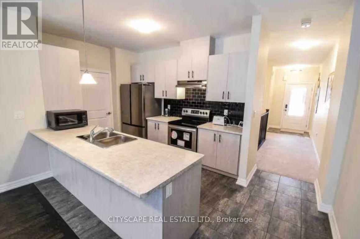 13 - 4311 MANN STREET Image 4