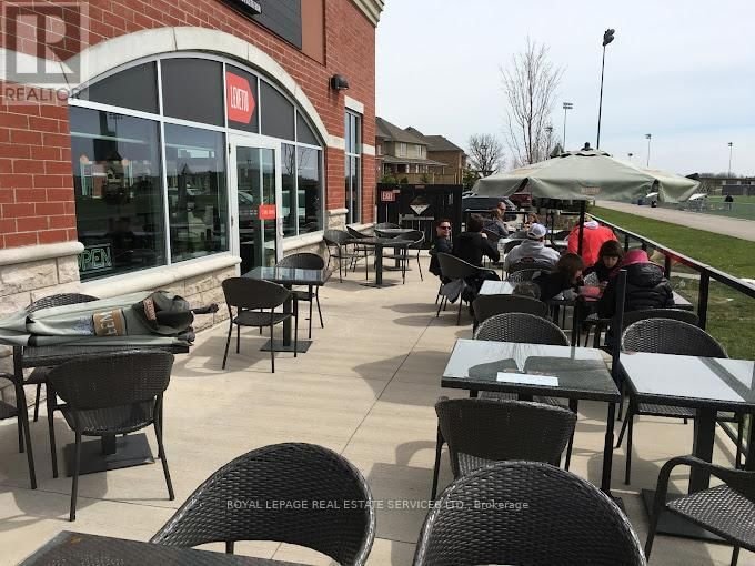Image #1 of Restaurant for Sale at 105 Oak Park Dr, Waterloo, Ontario