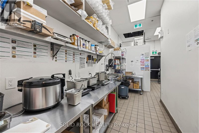 Image #1 of Restaurant for Sale at 225 Gore Rd, Kingston, Ontario