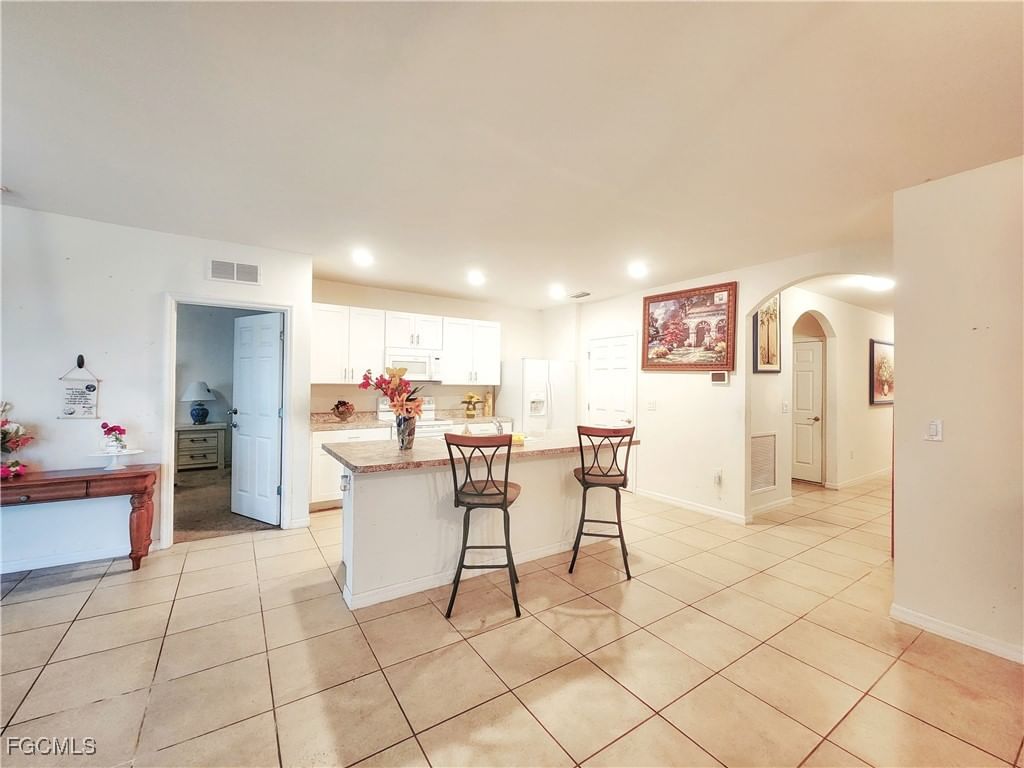 8330 Tortoise Isle Court, Lehigh Acres, FL 33972 photo 2