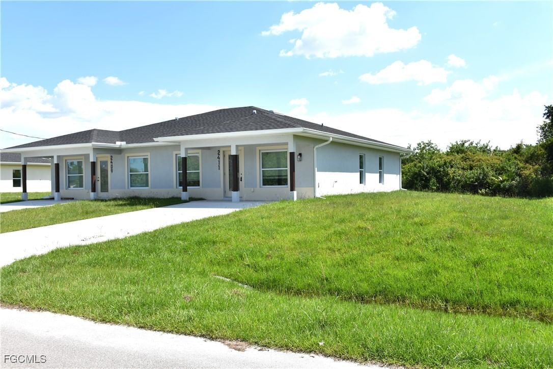 2409/2411 Churchill Avenue N, Lehigh Acres, FL 33971 photo 2