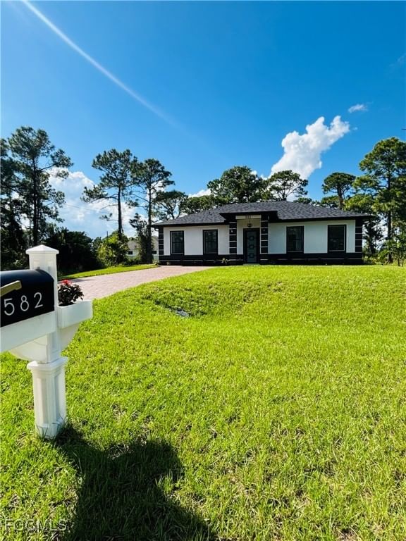 582 Eisenhower Boulevard, Lehigh Acres, FL 33974 photo 2