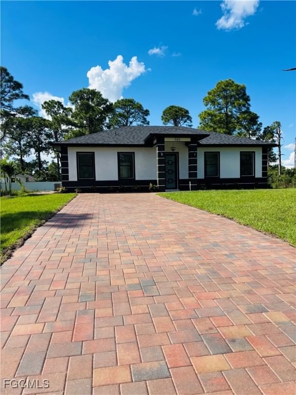 582 Eisenhower Boulevard, Lehigh Acres, FL 33974 photo 3
