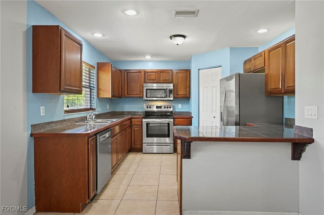 723 Newell Street E, Lehigh Acres, FL 33974 photo 3