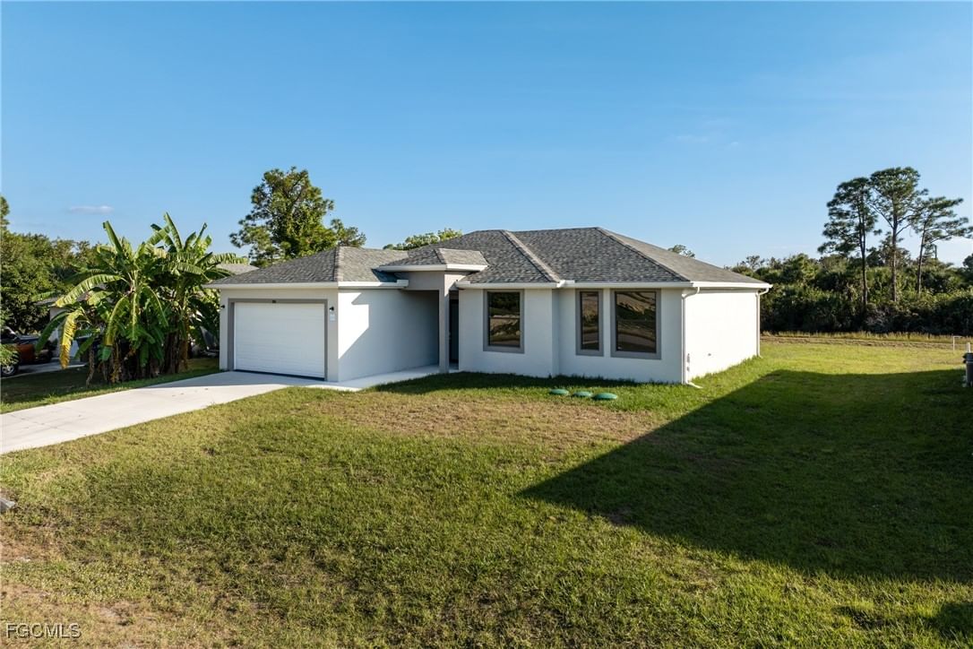 1134 Cumming Street E, Lehigh Acres, FL 33974 photo 2