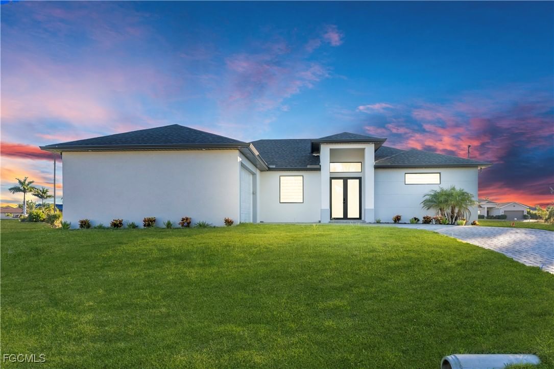 911 NW 37th Place, Cape Coral, FL 33993 photo 2