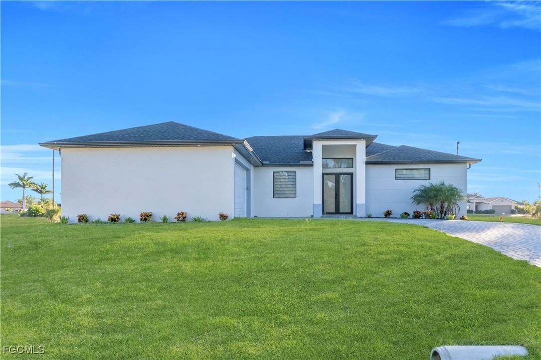 911 NW 37th Place, Cape Coral, FL 33993 photo 3