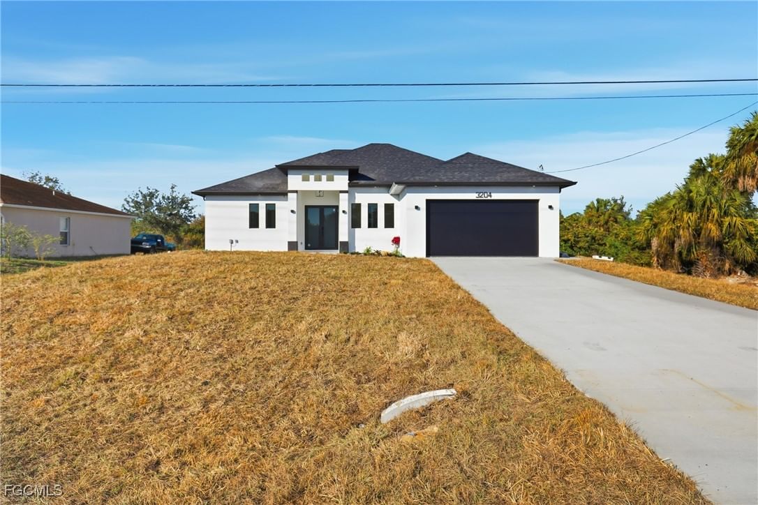 3204 Sunshine Boulevard S, Lehigh Acres, FL 33976 photo 2