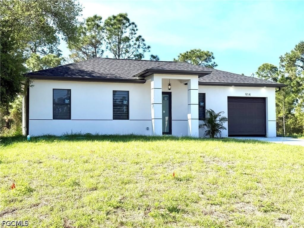 914 Sunrise Boulevard, Lehigh Acres, FL 33974 photo 3