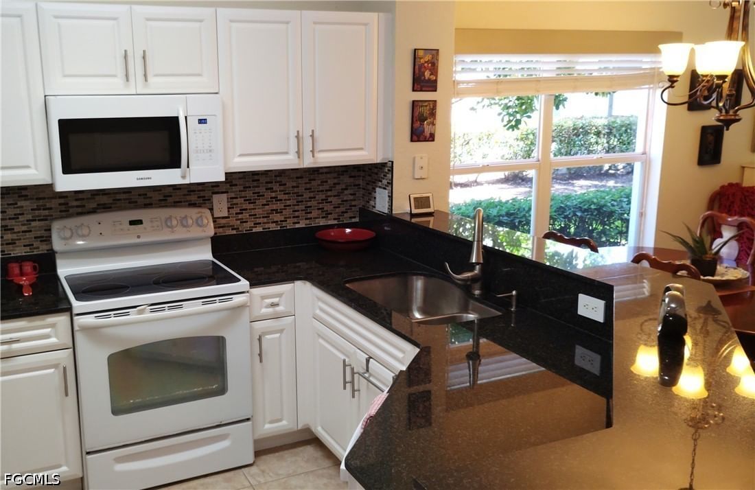 8629 Athena Court, Lehigh Acres, FL 33971 photo 3