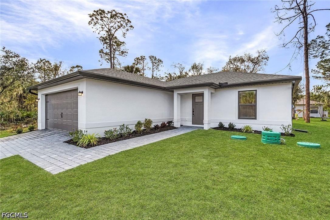 724 Goldrock Road, Lehigh Acres, FL 33974 photo 2