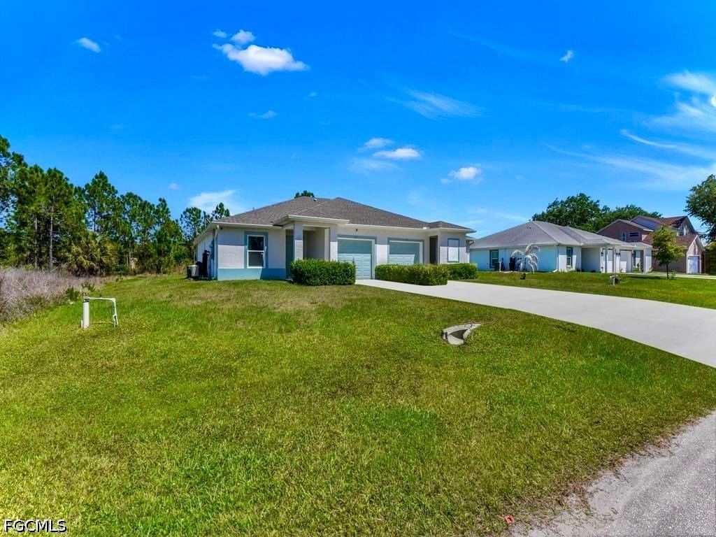 849/851 Bedford Drive, Lehigh Acres, FL 33974 photo 2