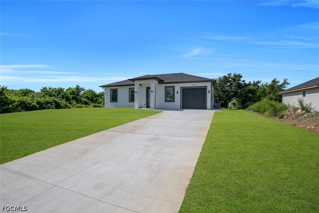2609 21st Street SW, Lehigh Acres, FL 33976 photo 2