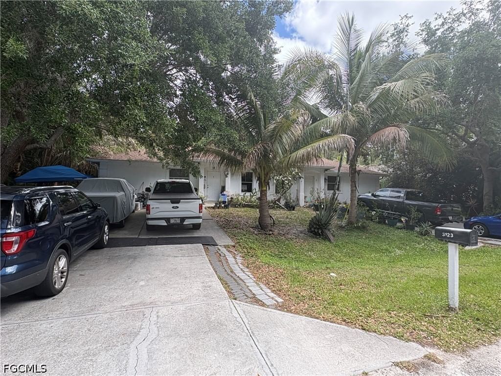 3123 Pine Tree Drive, Naples, FL 34112 photo 2