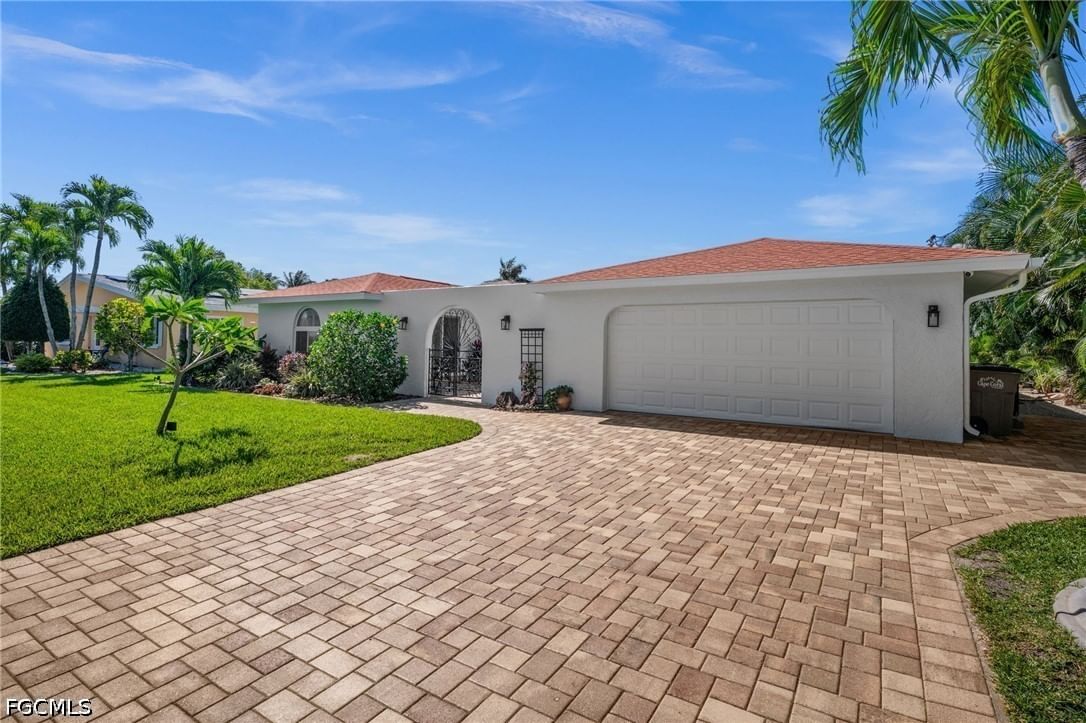 1432 Venetian Court, Cape Coral, FL 33904 photo 2