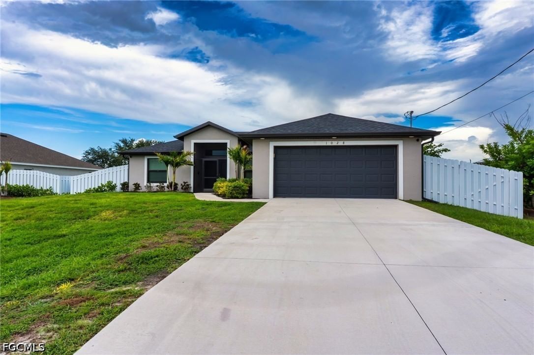 1028 Champion Avenue, Lehigh Acres, FL 33971 photo 2