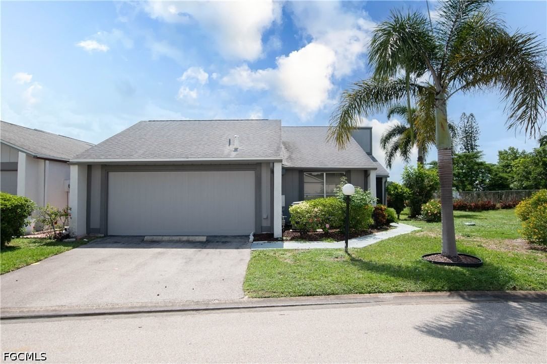 9749 Maplecrest Circle, Lehigh Acres, FL 33936 photo 2