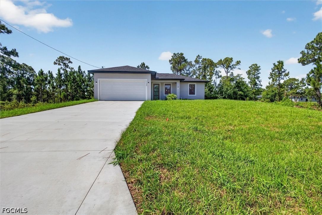1130 Dutchess Street E, Lehigh Acres, FL 33974 photo 2