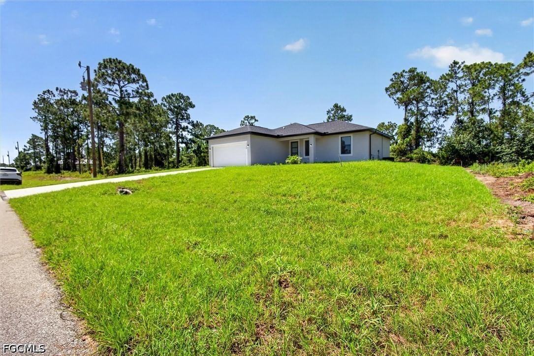 1130 Dutchess Street E, Lehigh Acres, FL 33974 photo 3