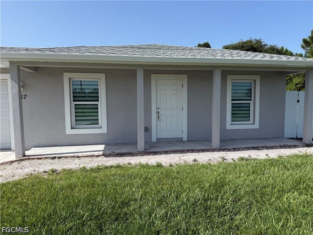 557 Oakshire Lane, Lehigh Acres, FL 33972 photo 2