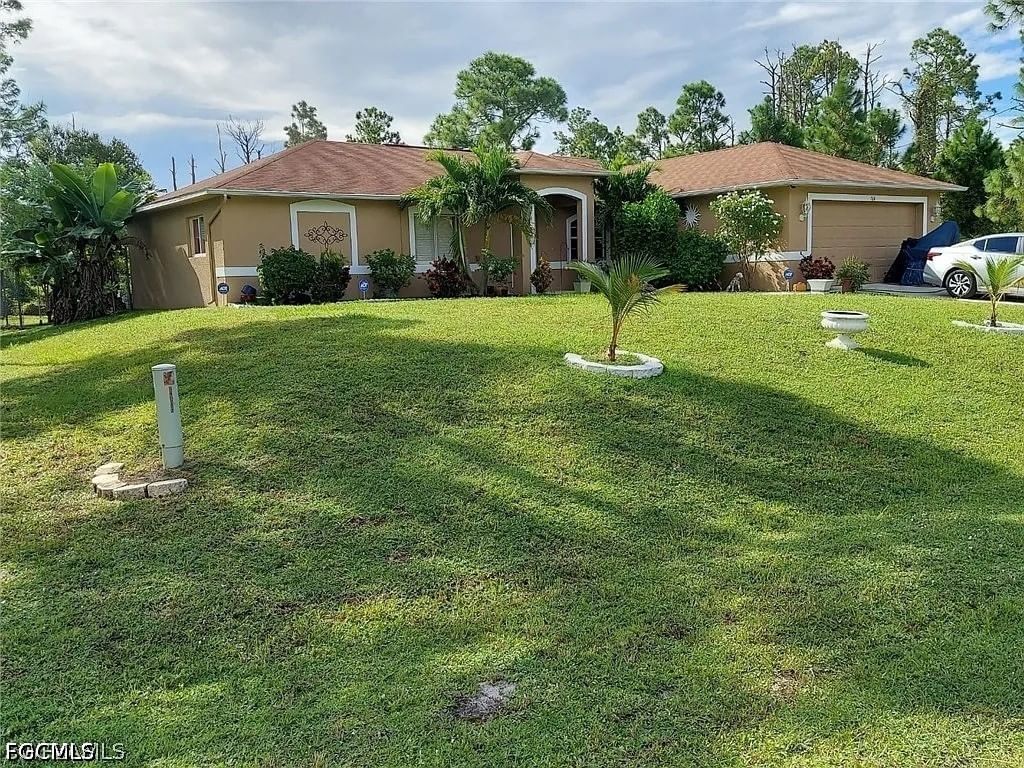 764 Chapman Avenue S, Lehigh Acres, FL 33974