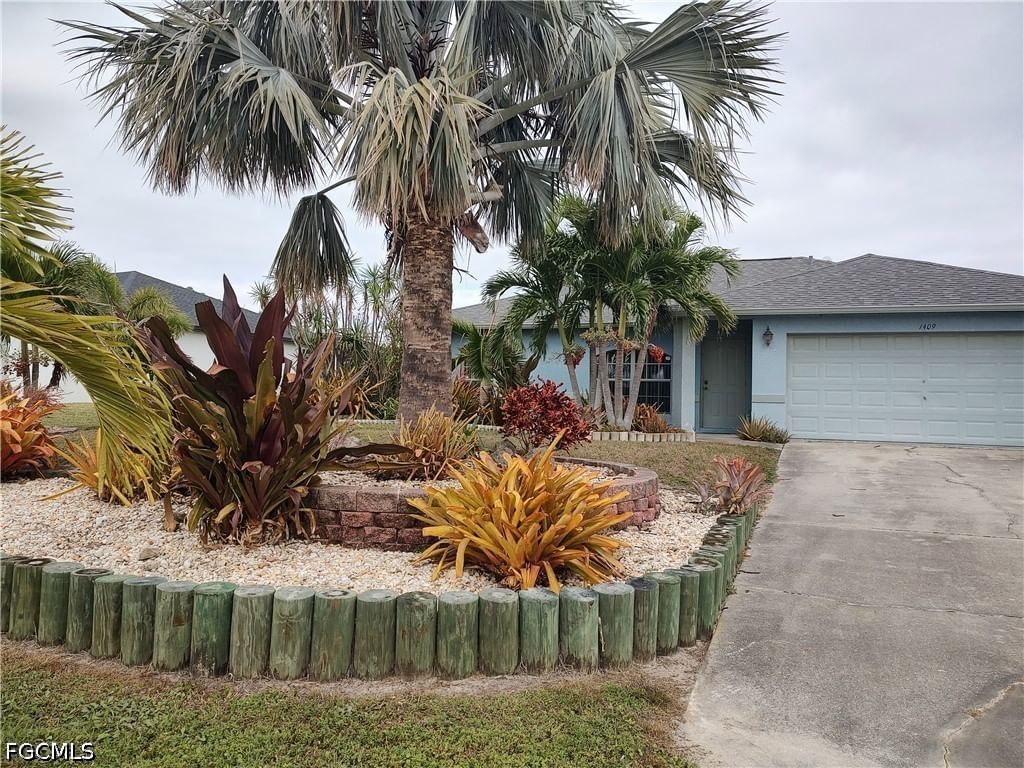 1409 NW 9th Terrace, Cape Coral, FL 33993 photo 2