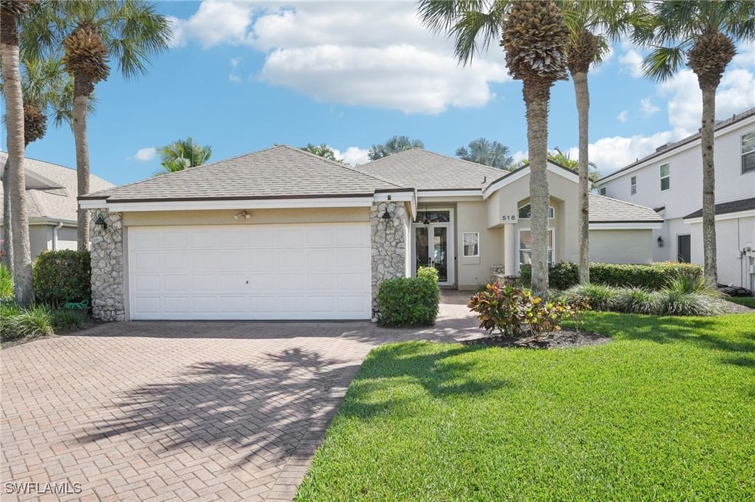 518 Cormorant Cove, Naples, FL 34113 photo 3